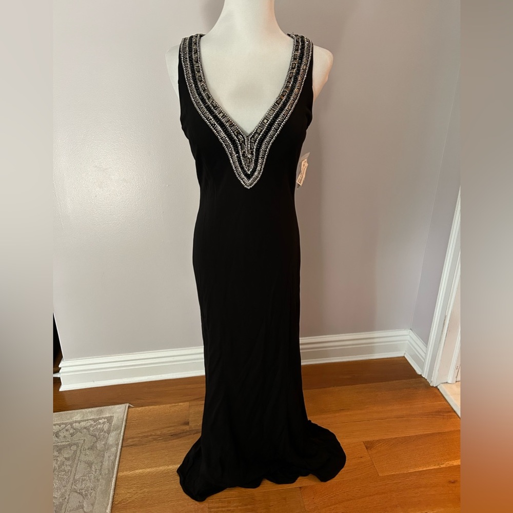 Beautiful Mieka black tie dress with sliver beading. Never Worn